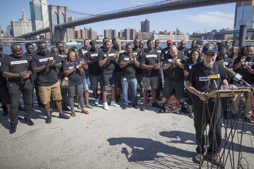 Retired New York City Police Officer Frank Serpico is surrounded by members of law enforcement as he speaks during a rally to show support for Colin Kaepernick, Saturday, Aug. 19, 2017, in New York. K ...