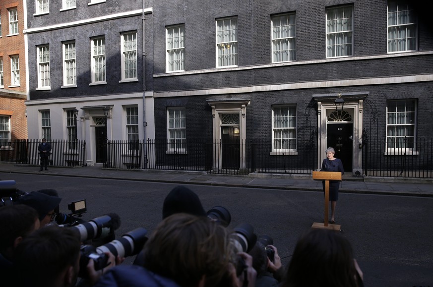 Britain&#039;s Prime Minister Theresa May speaks to the media outside her official residence of 10 Downing Street in London, Tuesday April 18, 2017. British Prime Minister Theresa May announced she wi ...