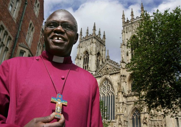 The Right Rev John Sentamu, 56, poses outside at York Minster in York, England, Friday June 17 2005, after being named as the Archbishop of York designate. The Ugandan-born cleric, who opposes gay pri ...
