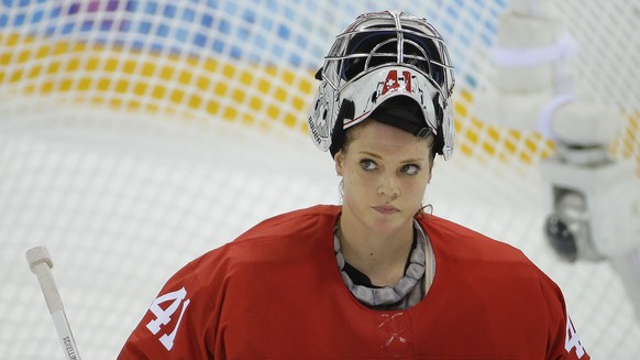 Goalkeeper Florence Schelling of Switzerland skates off the ice at the end of the first period of the 2014 Winter Olympics women&#039;s semifinal ice hockey game against Canada at Shayba Arena, Monday ...