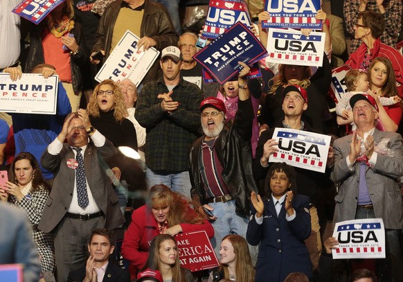 epa05655899 Supporters cheer US President-elect Donald Trump (not pictured) as he speaks during the first stop of his &#039;USA Thank You Tour 2016&#039; rally at US Bank Arena in Cincinnati, Ohio, US ...