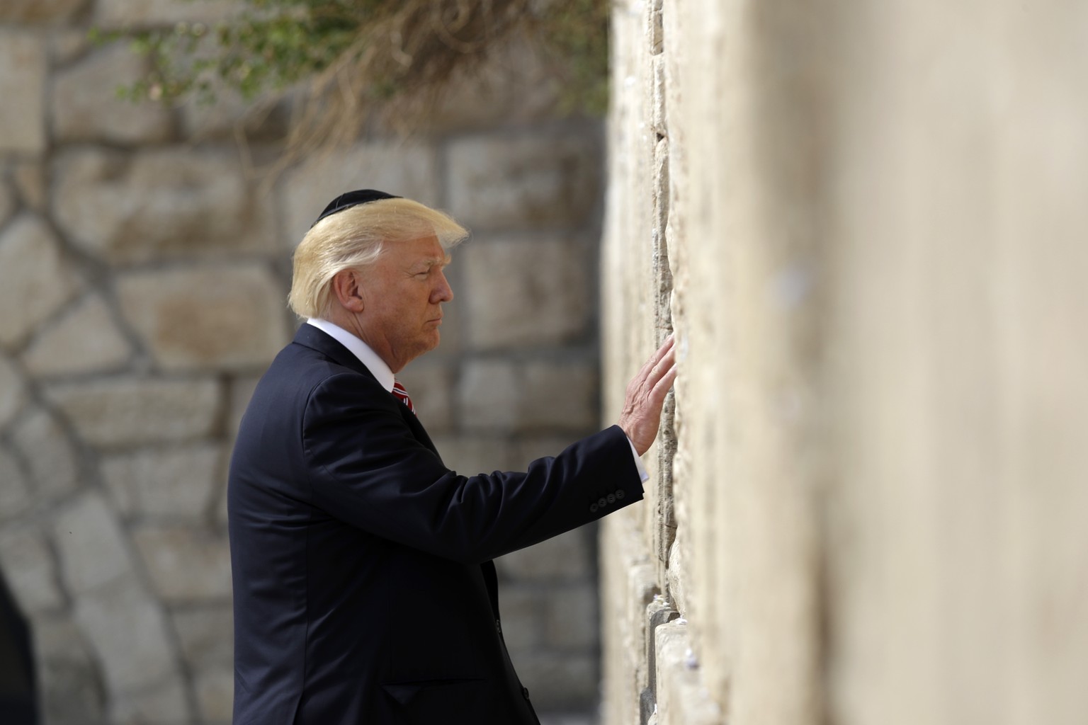 President Donald Trump visits the Western Wall, Monday, May 22, 2017, in Jerusalem. (AP Photo/Evan Vucci)