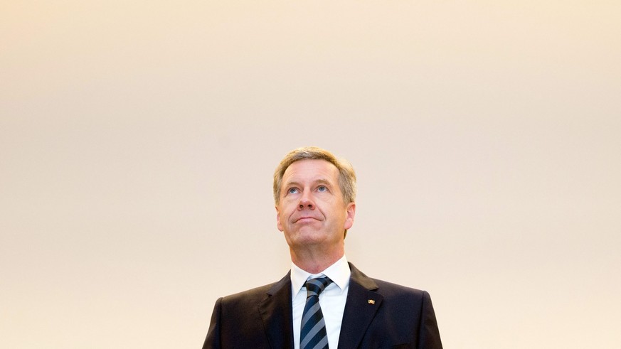 epa04057068 Former German President Christian Wulff stands in the regional court in Hanover, Germany, 06 February 2014. Wulff, who is seeking to be fully acquitted, stands accused of accepting favours ...