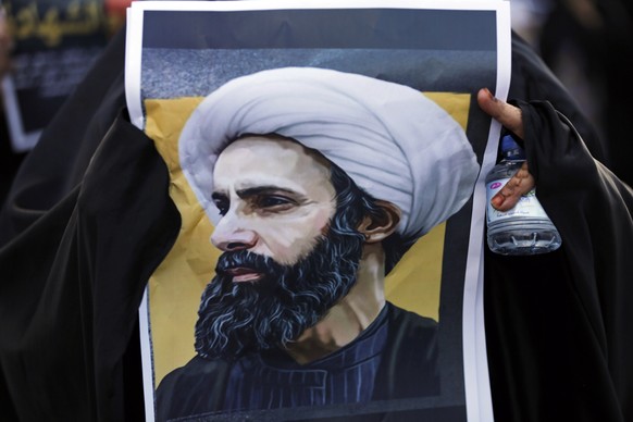Porträt des hingerichteten schiitischen Geistlichen Nimr al-Nimr bei einer Demonstration in Bahrain.