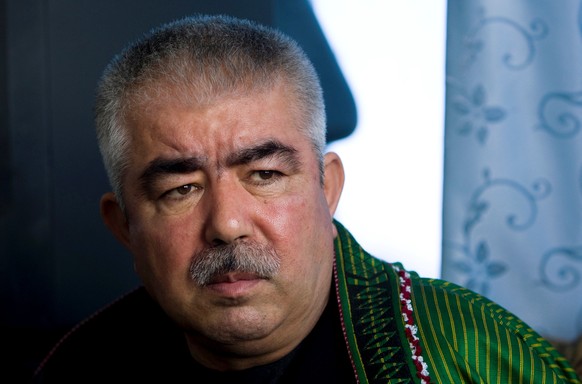 Afghan General Abdul Rashid Dostum speaks during an interview with Reuters at his Palace in Shibergan, in northern Afghanistan August 19, 2009. REUTERS/Caren Firouz/File Photo