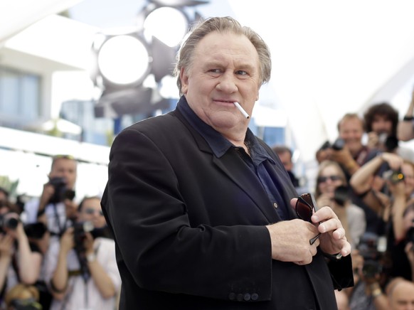 Le pr�sident Emmanuel Macron a jug� mercredi pr�matur� de parler d&#039;une proc�dure qui pourrait �ter la L�gion d&#039;honneur � G�rard Depardieu (archives).