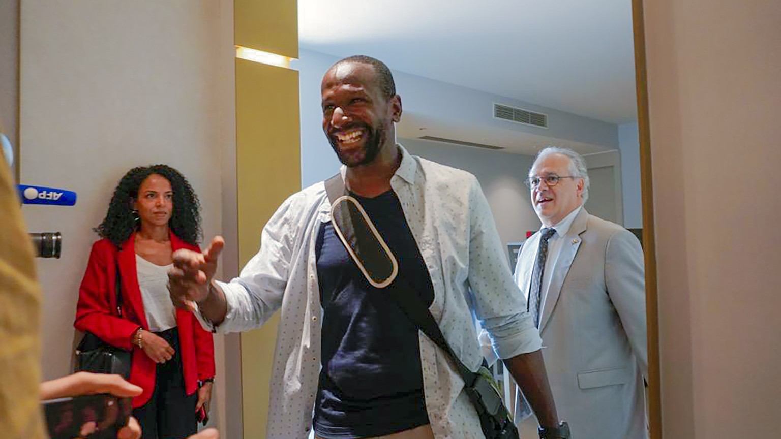 French journalist Olivier Dubois arrives at the VIP lounge at the airport in Niamey, Niger, Monday March 20, 2023. Dubois, who was abducted almost two years ago, was released alongside American aid wo ...