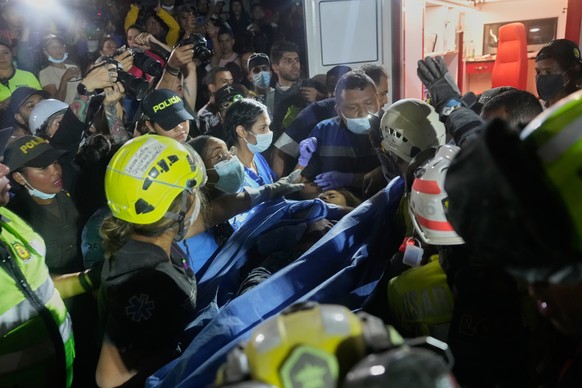 Rescue workers carry a survivor Daniela Largo after pulling her from the rubble the day after an earthquake struck Pereira, Colombia, Tuesday, Aug. 11, 2026. (AP Photo/Fernando Vergara)
Colombia Earth ...