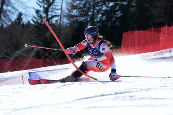 Switzerland's Melanie Meillard speeds down the course during an alpine ski, women's slalom race, at the 2026 Winter Olympics, in Cortina d'Ampezzo, Italy, Wednesday, Feb. 18, 2026. (AP  ...