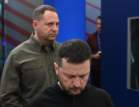 epa11707166 Ukrainian President Volodymyr Zelensky (front) and Andriy Yermak, Head of the Office of the President of Ukraine attend a plenary session of the 5th summit of the European Political Commun ...