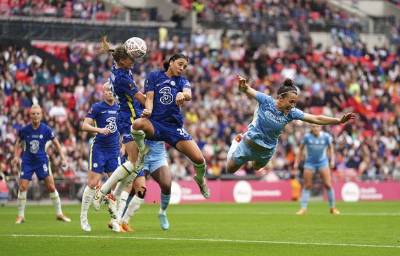 Chelsea&#039;s Magdalena Eriksson, left and Sam Kerr compete for the ball with Manchester City&#039;s Lucy Bronze, during the Women&#039;s FA Cup final soccer match between Chelsea and Manchester City ...