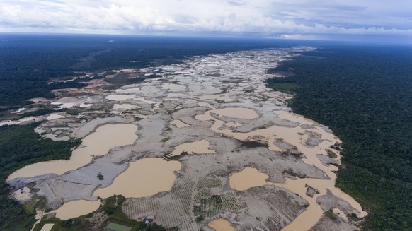 In this Wednesday, Jan. 17, 2018 photo, an area lays deforested by illegal gold mining in the Madre de Dios province of Peru, one day before Pope Francis arrives to Peru&amp;#039;s Amazon. In a letter ...