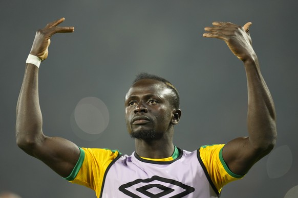 FILE- Senegal&#039;s Sadio Mane gestures prior to the start of the African Cup of Nations 2022 final soccer match between Senegal and Egypt at the Ahmadou Ahidjo stadium in Yaounde, Cameroon, on Feb.  ...