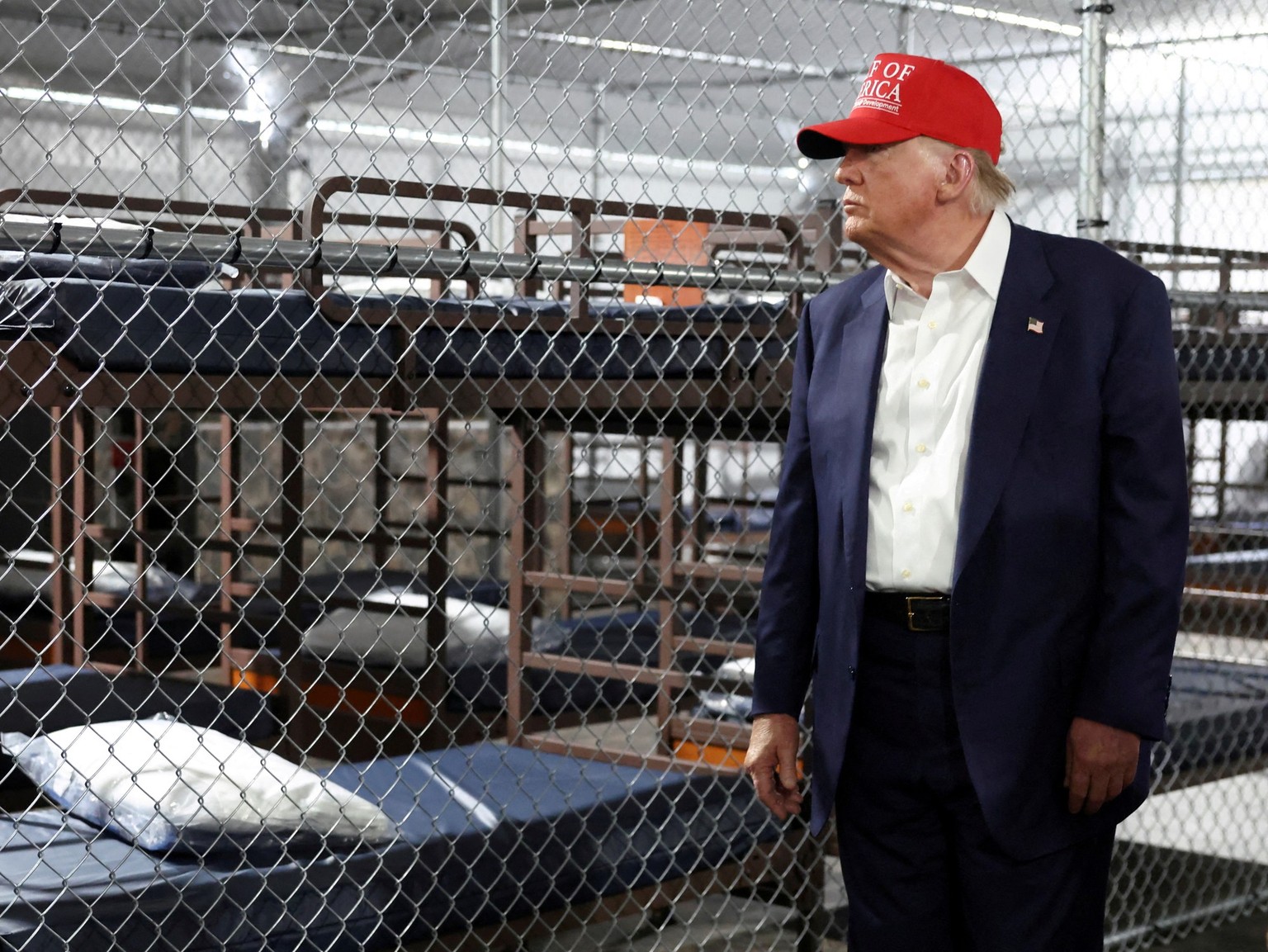 FILE PHOTO: U.S. President Donald Trump visits a temporary migrant detention center informally known as &quot;Alligator Alcatraz&quot; in Ochopee, Florida, U.S., July 1, 2025. REUTERS/Evelyn Hockstein ...