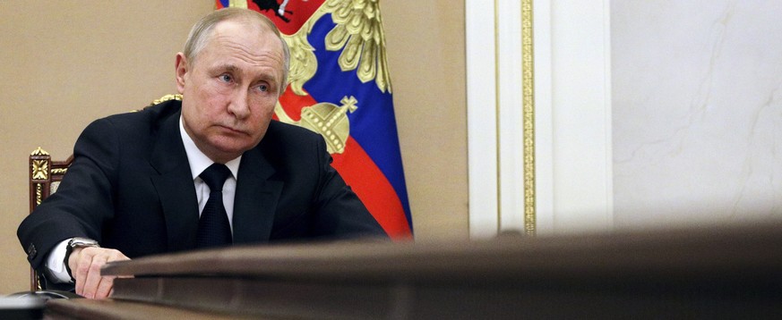 FILE - Russian President Vladimir Putin chairs a meeting with members of the government via teleconference in Moscow, on March 10, 2022. (Mikhail Klimentyev, Sputnik, Kremlin Pool Photo via AP, File)