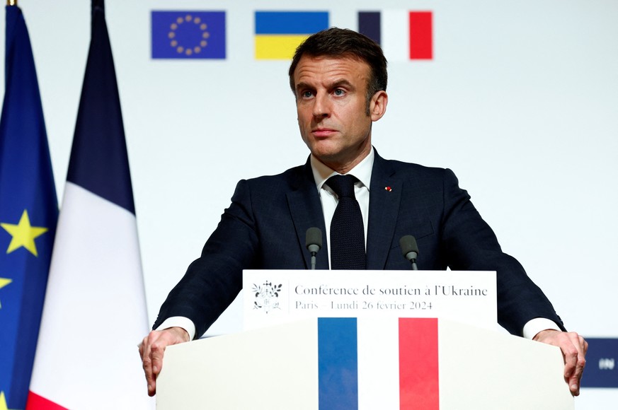 epa11183592 French President Emmanuel Macron speaks during a press conference at the end of the conference in support of Ukraine, with European leaders and government representatives, at the Elysee Pa ...