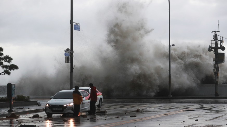 Waves crash over the breakwater in Busan, South Korea, Tuesday, Sept. 6, 2022. Thousands of people were forced to evacuate in South Korea as Typhoon Hinnamnor made landfall in the country&#039;s south ...