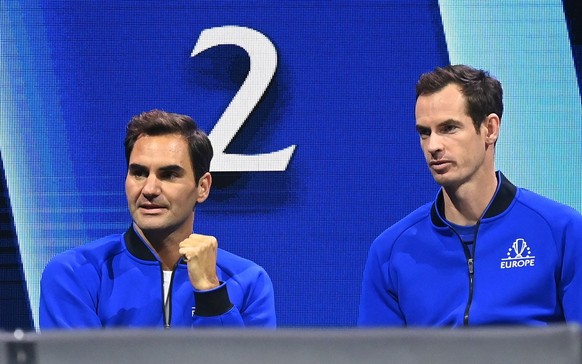 epa10203710 Team Europe players Roger Federer (L) and Andy Murray (R) react during the Laver Cup tennis tournament at the O2 Arena in London, Britain, 24 September 2022. EPA/ANDY RAIN