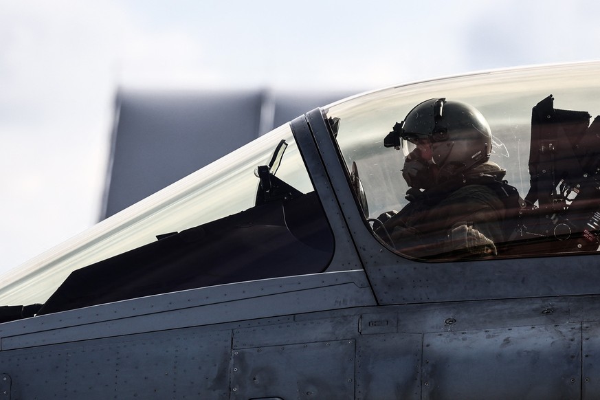 A French Air Force pilot gets ready for take off in a Rafale fighter jet prior to a joint mission with Polish F16s at an air base in Minsk Mazowiecki on September 17, 2025, as part of the Eastern Sent ...