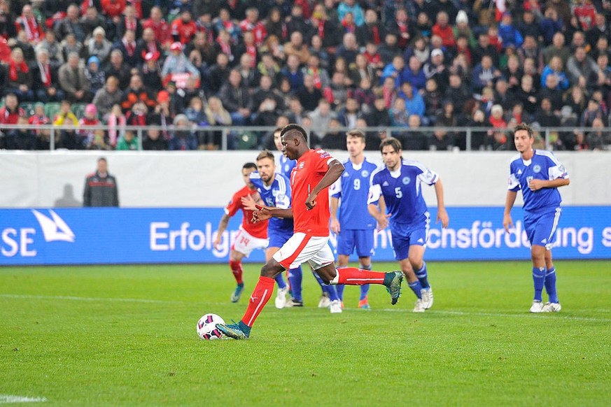ST GALLEN, SWITZERLAND - OCTOBER 09: Breel Embolo of Switzerland shoots the third penalty during the UEFA EURO 2016 qualifier between Switzerland and San Marino at AFG Arena on October 9, 2015 in St G ...