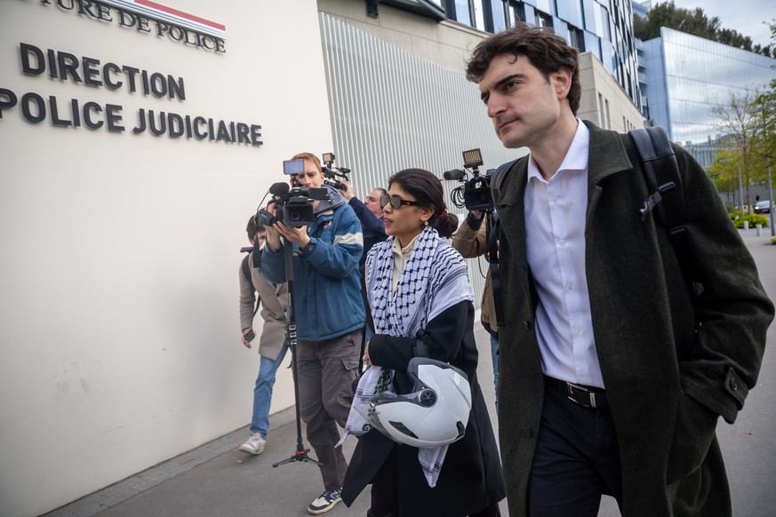 epaselect epa12867093 French MEP Rima Hassan (L) and her lawyer Vincent Brengarth (R) arrive at the Paris Police Prefectures Criminal Investigation Department, where Hassan is due to be questioned fo ...