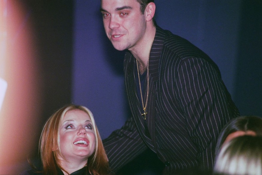 English singers Robbie Williams and Geri Halliwell attend the Capital Radio Awards ceremony, London, 26th March 1997. (Photo by Dave Benett/Getty Images)