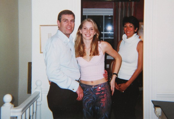 Prince Andrew and Virginia Roberts Prince Andrew smiling as he stands with his left arm around the waist of a young Virginia Roberts now Virginia Giuffre. It is alleged to have been taken in early 200 ...