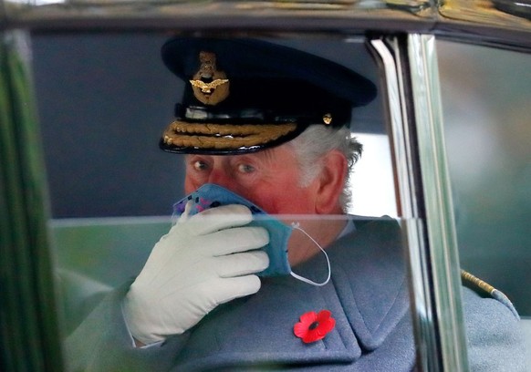 LONDON, UNITED KINGDOM - NOVEMBER 08: (EMBARGOED FOR PUBLICATION IN UK NEWSPAPERS UNTIL 24 HOURS AFTER CREATE DATE AND TIME) Prince Charles, Prince of Wales seen wearing a face mask as he travels in h ...