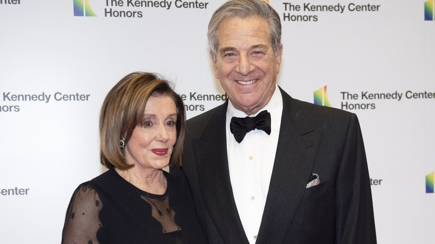 FILE - Speaker of the House Nancy Pelosi, D-Calif., and her husband, Paul Pelosi, arrive at the State Department for the Kennedy Center Honors State Department Dinner, on Dec. 7, 2019, in Washington.  ...