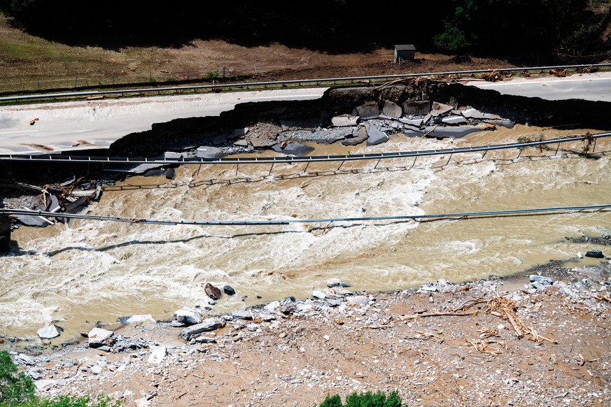 epa11430369 A picture taken with a drone of A13 highway between Lostallo and Soazza destroyed by the force of the Moesa river, caused by the bad weather and heavy rain in the Misox valley, in Lostallo ...