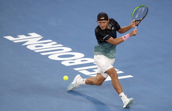 France&#039;s Lucas Pouille makes a backhand return to Serbia&#039;s Novak Djokovic during their semifinal at the Australian Open tennis championships in Melbourne, Australia, Friday, Jan. 25, 2019. ( ...