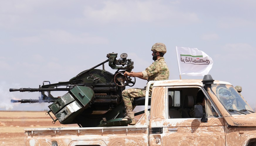 epa10827680 Turkey-backed Syrian fighters attend a military training in Marea town, in the rebel-held part of Aleppo Governorate, northwestern Syria, 29 August 2023. Fighters of Turkey-backed factions ...