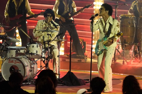 Anderson .Paak, left, and Bruno Mars of Silk Sonic perform &quot;777&quot; at the 64th Annual Grammy Awards on Sunday, April 3, 2022, in Las Vegas. (AP Photo/Chris Pizzello)
Anderson .Paak,Bruno Mars