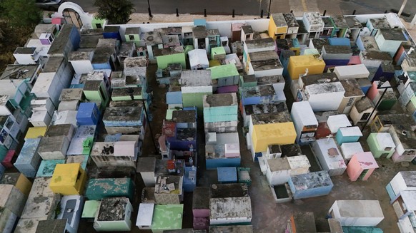 Aerial view of the Pomuch cemetery, Campeche state, Mexico on October 18, 2025. The cleansing ritualówhich combines Mayan and Catholic elementsóis distinctive to Pomuch. Mexicans clean the remains of  ...