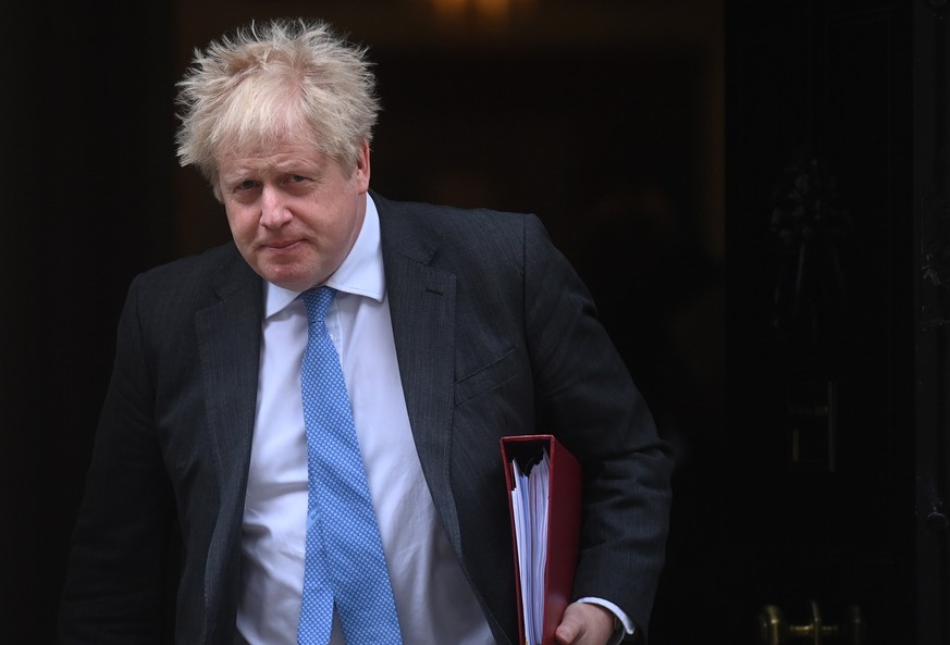 epa09911851 Britain���s Prime Minister Boris Johnson departs Downing Street to attend a Prime Minister&#039;s Questions (PMQs) session in London, Britain, 27 April 2022. EPA/NEIL HALL