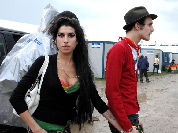 (EXCLUSIVE, Premium Rates Apply) Amy Winehouse and husband Blake Fielder-Civil (Photo by Shirlaine Forrest/WireImage)
