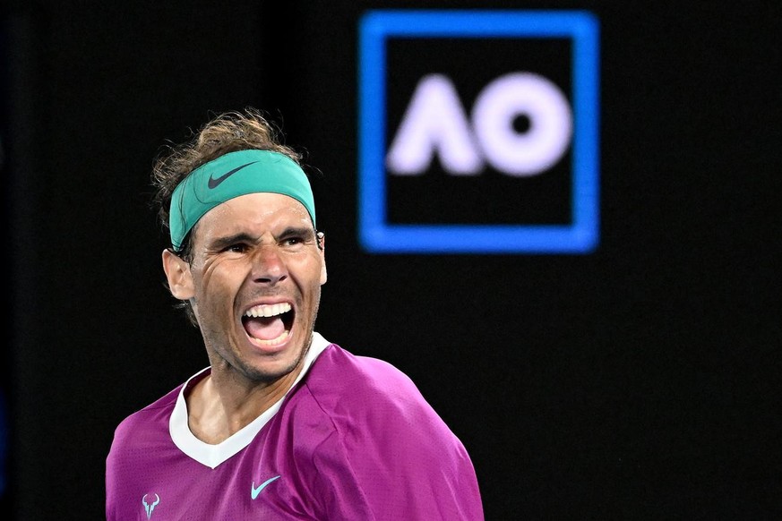 epa09713774 Rafael Nadal of Spain celebrates winning his semi final match against Matteo Berrettini of Italy at the Australian Open Grand Slam tennis tournament at Melbourne Park, in Melbourne, Austra ...