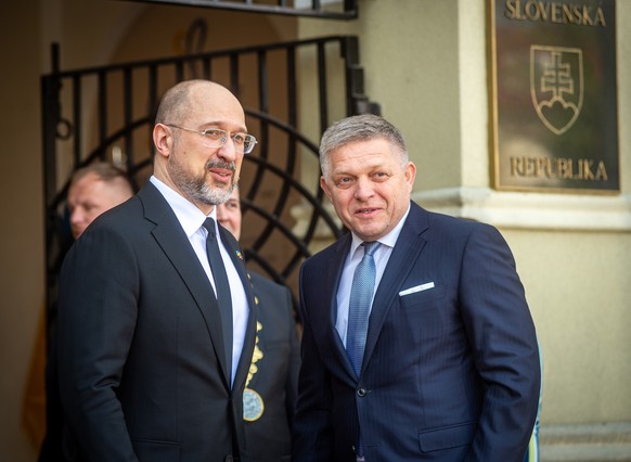 epa11271887 Ukrainian Prime Minister Denys Shmyhal (L) and Slovak Prime Minister Robert Fico (R) arrive to attend an intergovernmental meeting of Slovakia&#039;s and Ukraine&#039;s governments in Mich ...