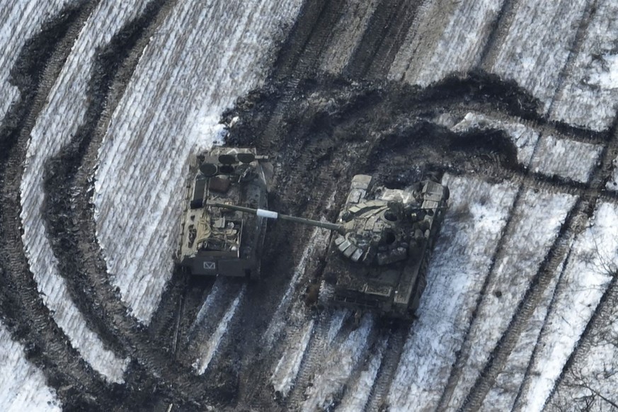 In this image from Ukrainian Armed Forces and taken in Feb. 2023 shows damaged Russian tanks in a field after attempting to attack, Vuhledar, Ukraine. The battle for the small coal-mining town of Vuhl ...