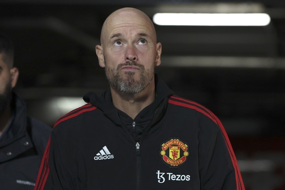 Manchester United&#039;s manager Erik ten Hag reacts as he walks onto the pitch ahead of he soccer match between Manchester United and Melbourne Victory at the Melbourne Cricket Ground, Australia, Fri ...