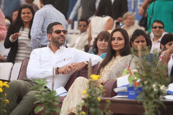 NEW DELHI, INDIA - NOVEMBER 22: Sunjay Kapur and Shallu Jindal during the Polo match hosted by Bindu and Rana Kapoor (MD and CEO, Yes Bank), at Jaipur Polo Ground on November 22, 2015 in New Delhi, In ...