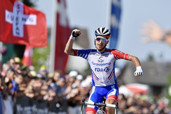 Sebastien Reichenbach gewinnt die Rad-Strassen Schweizermeisterschaften in Oberwangen (TG) am Sonntag, 30. Juni 2019. (KEYSTONE/Walter Bieri)