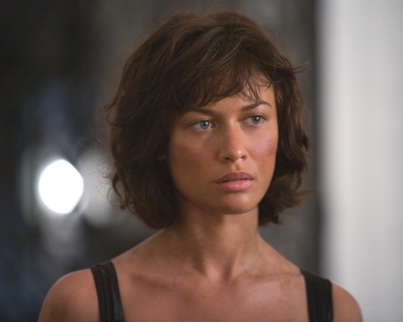 This undated image provided by Sony Pictures shows Olga Kurylenko, who plays Camille, during a scene in the new James Bond film where she returns to the Grand Hotel Bolivia after her ordeal at the han ...