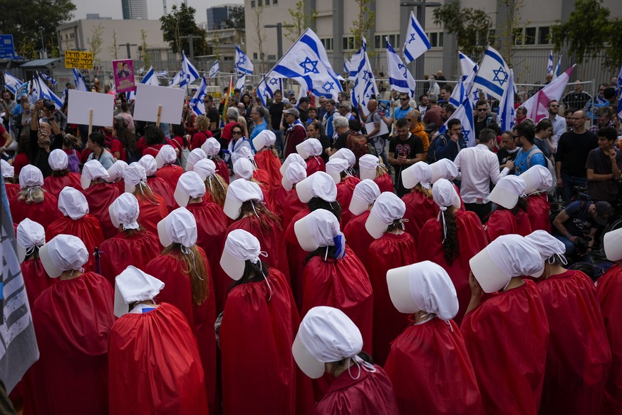 Protesters supporting women&#039;s rights dressed as characters from The Handmaid&#039;s Tale TV series protest agains plans by Prime Minister Benjamin Netanyahu&#039;s government to overhaul the judi ...