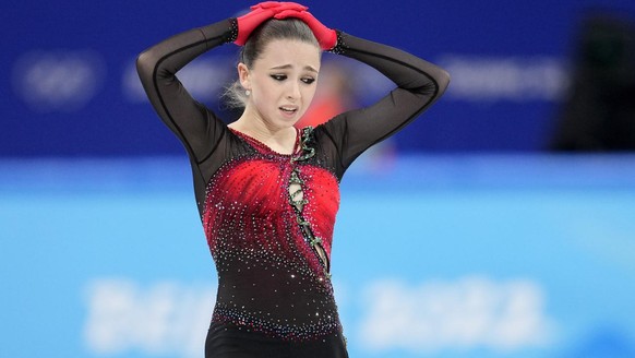 Kamila Valieva, 15, of the Russian Olympic Committee, reacts after the women&#039;s team free skate program during the figure skating competition at the 2022 Winter Olympics, Monday, Feb. 7, 2022, in  ...