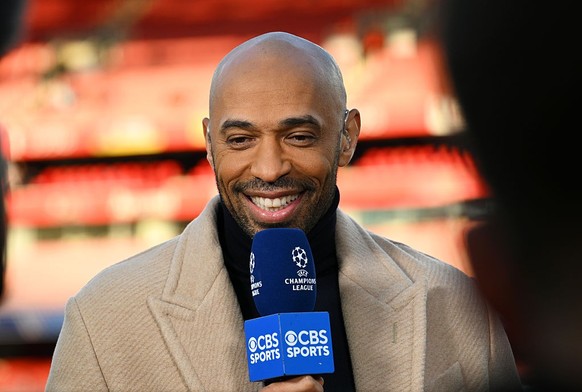 LONDON, ENGLAND - APRIL 08: Thierry Henry reacts whilst speaking for CBS Sports prior to the UEFA Champions League 2024/25 Quarter Final First Leg match between Arsenal FC and Real Madrid C.F. at Arse ...