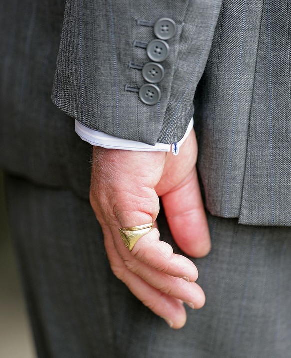 DORKING, UNITED KINGDOM - MAY 26: (EMBARGOED FOR PUBLICATION IN UK NEWSPAPERS UNTIL 48 HOURS AFTER CREATE DATE AND TIME) Prince Charles&#039; signet ring and wedding ring seen on his little finger of  ...