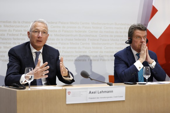 Axel Lehmann, Chairman Credit Suisse, left, speaks beside Colm Kelleher, Chairman UBS, during a press conference, on Sunday, 19 March 2023 in Bern. The bank UBS takes over Credit Suisse for 2 billion  ...
