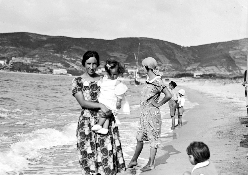 Holiday on the Elba Island portrait of a woman with a child on the beach of Procchio 3564401 Holiday on the Elba Island portrait of a woman with a child on the beach of Procchio addinfo Holiday on the ...