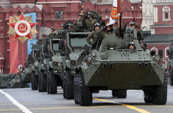 epa11328547 Russian military armored vehicles take part in the Victory Day military parade on the Red Square in Moscow, Russia, 09 May 2024. Russia marks the 79th anniversary of the victory in World W ...